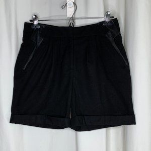 Shorts with leather panels